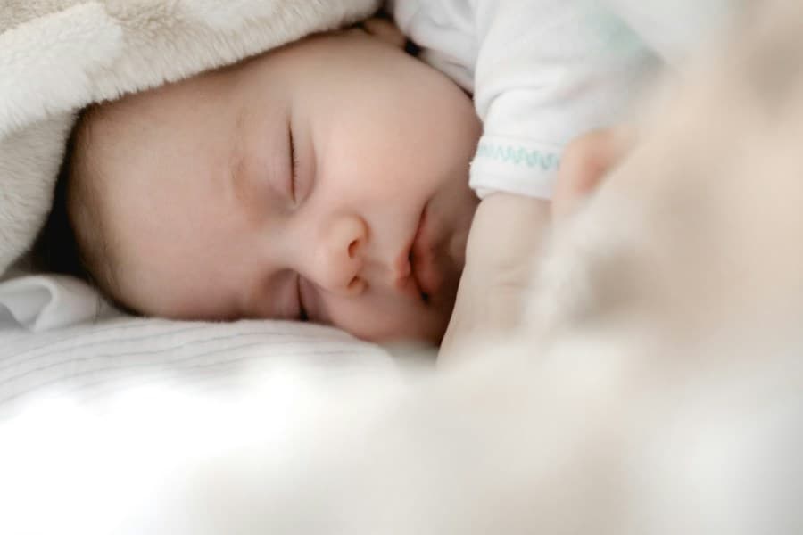 A newborn sleeping peacefully